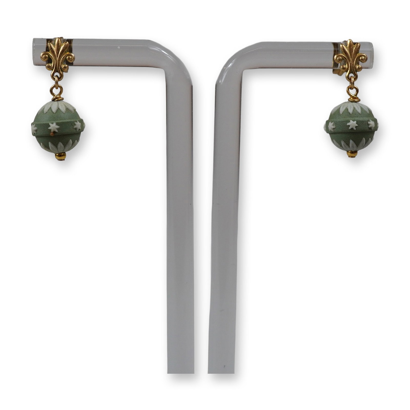 A Pair of Wedgwood Sage Green Jasperware Drop Earrings: A matched pair of vintage drop earrings featuring sage green jasperware beads. The earrings are designed for pierced ears with gold-toned fleur-de-lis motif posts. Each spherical stoneware bead