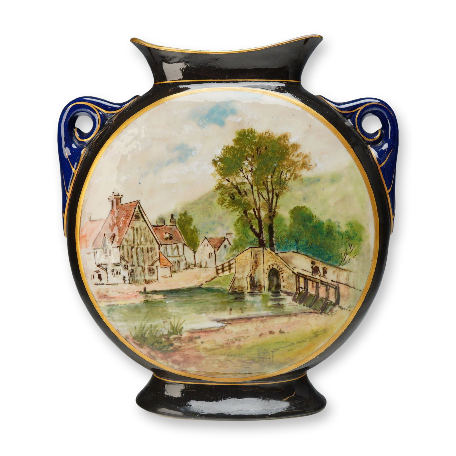 Wedgwood Glazed Earthenware Moon Flask, circa 1880: This nineteenth-century glazed earthenware moon flask was produced by Wedgwood. The vessel features a flattened circular body, a flared neck with a wavy rim, and two cobalt-glazed scroll handles at th