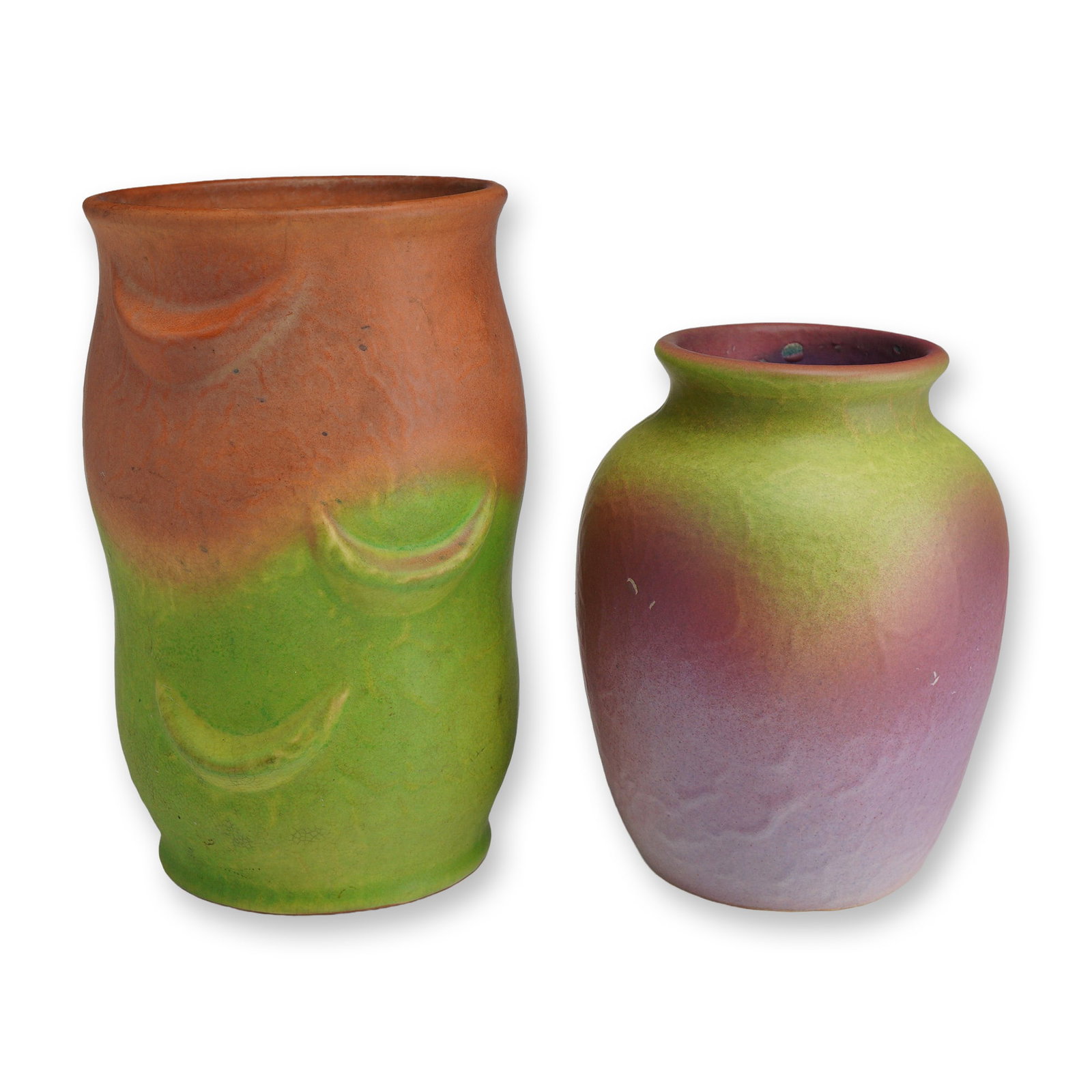 Two Weller Pottery Vases, Elberta: Weller Pottery Elberta pattern dates to the 1930s Art Deco period. The taller vessel (7.5") features a cylindrical form with a matte glaze transitioning from orange at the rim to lime green at the bas