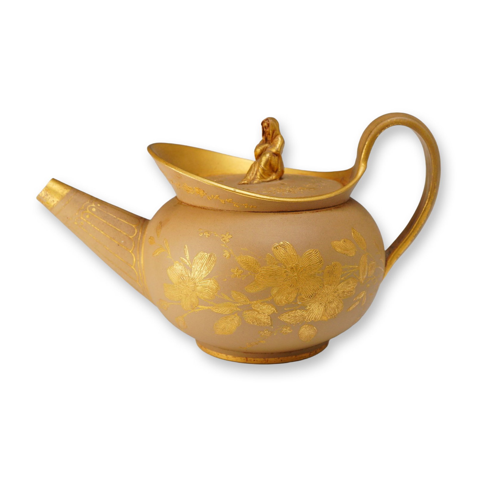 Wedgwood Caneware Teapot with Sybil Finial: This Wedgwood caneware teapot is crafted from fine-grained, unglazed buff-colored stoneware. The body and lid are decorated with hand-applied gilding. The lid is surmounted by a gilded Sybil finial, a
