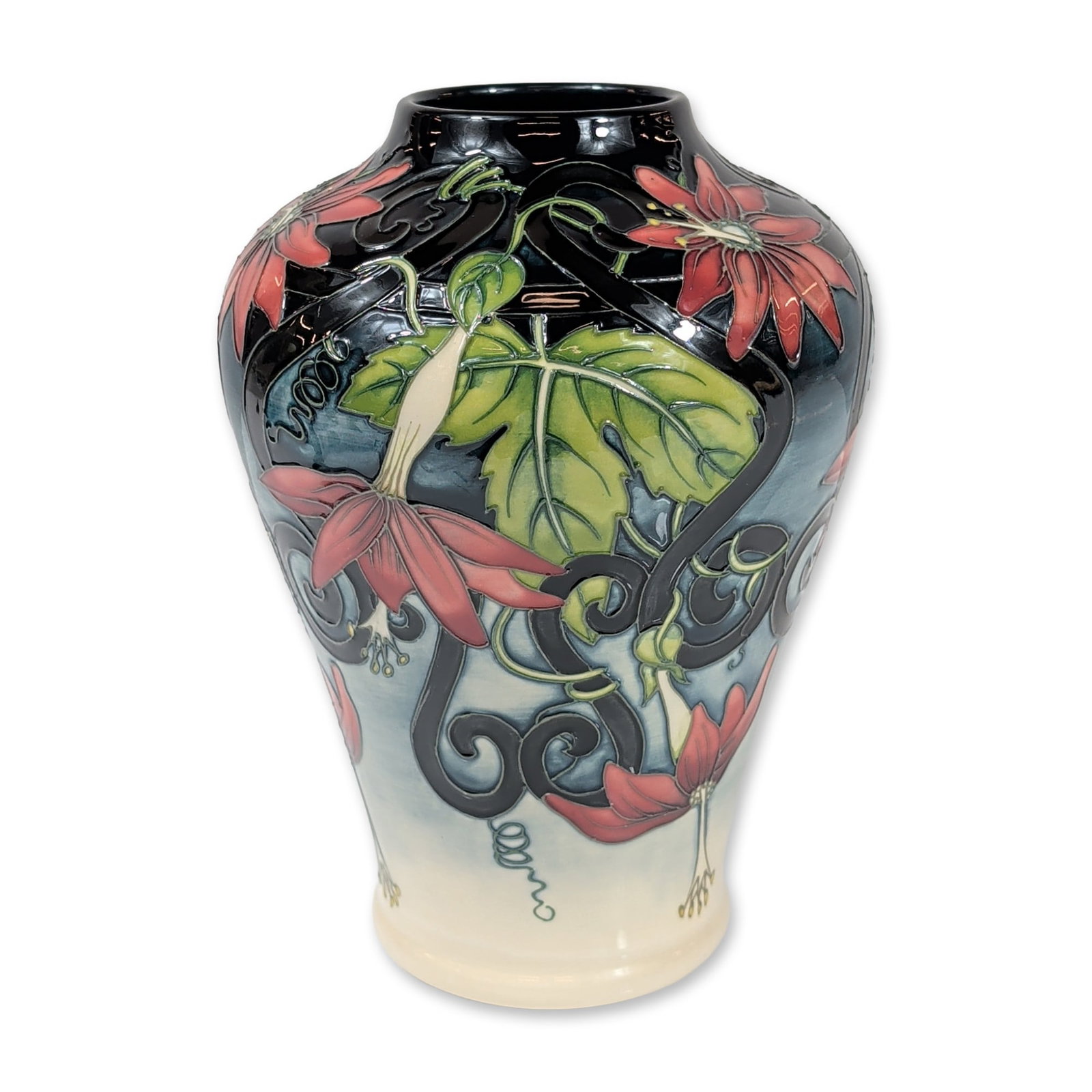 Moorcroft Anji Davenport Convolvulus Vase: Moorcroft Pottery, Stoke-on-Trent, England. Tapered earthenware vase in the Convolvulus pattern, designed by Anji Davenport and produced in 2001. The body features hand-painted tubelined decoration wi