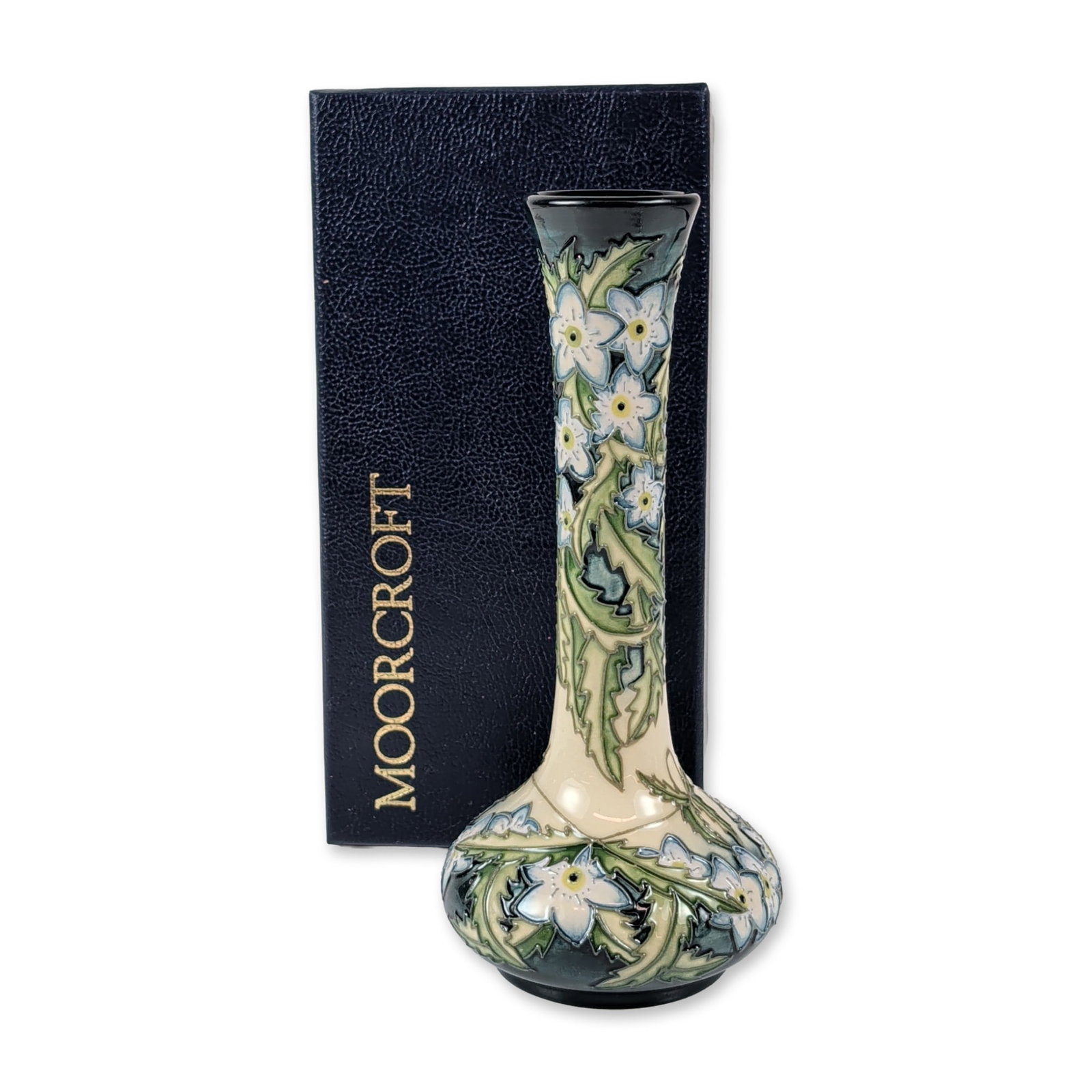 Moorcroft Rachel Bishop Baby Blue Eyes Ceramic Vase: Moorcroft Pottery, Stoke-on-Trent, England, dated 2000. A tubelined earthenware vase in the Baby Blue Eyes pattern designed by Rachel Bishop for the Mothers Nursery Collection. The form features a tal