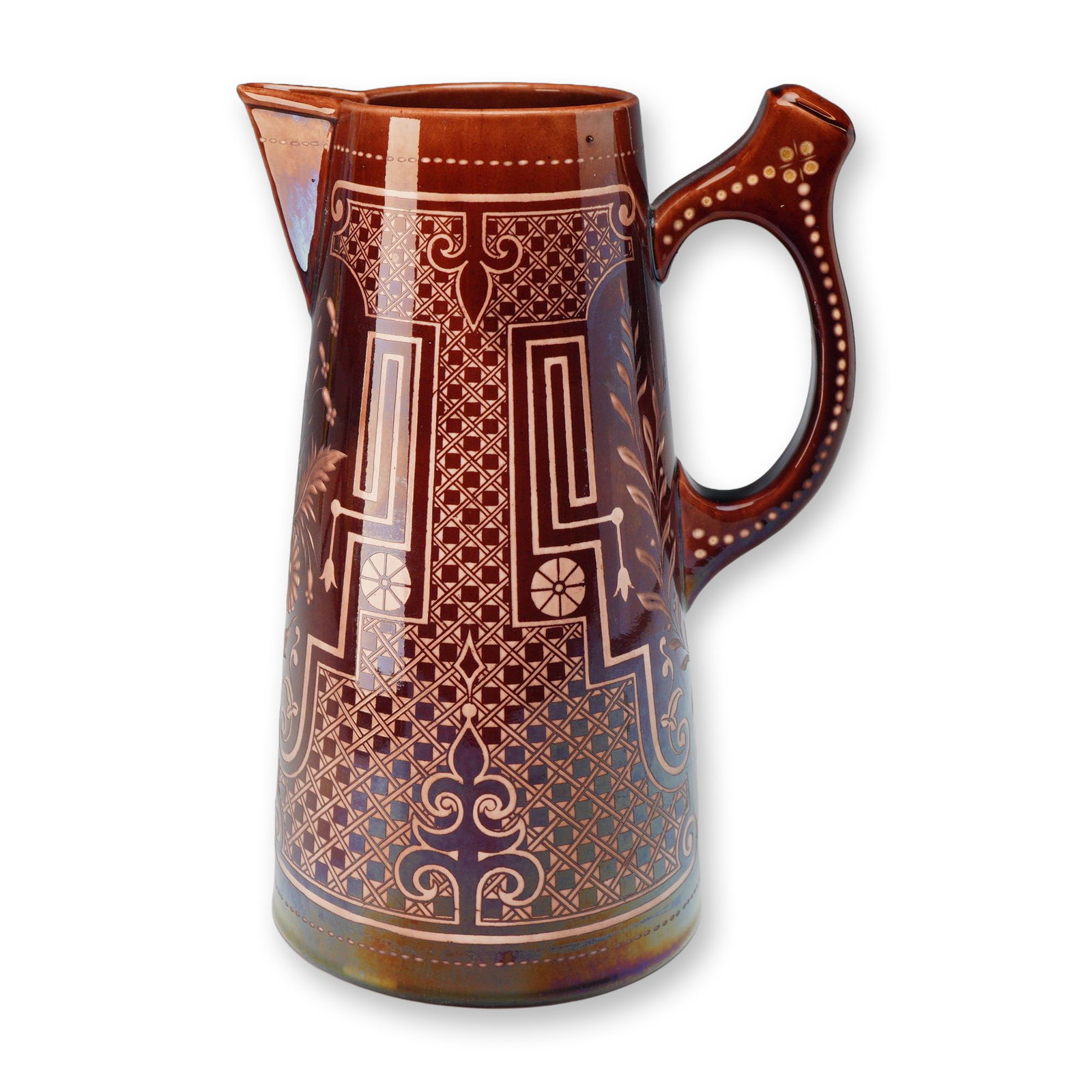 Wedgwood Brown Ceramic Stoneware Jug: This Wedgwood brown ceramic stoneware jug features a tapered conical form with a deep chocolate brown glaze. The vessel is decorated with elaborate Arts and Crafts and Aesthetic Movement motifs, inclu