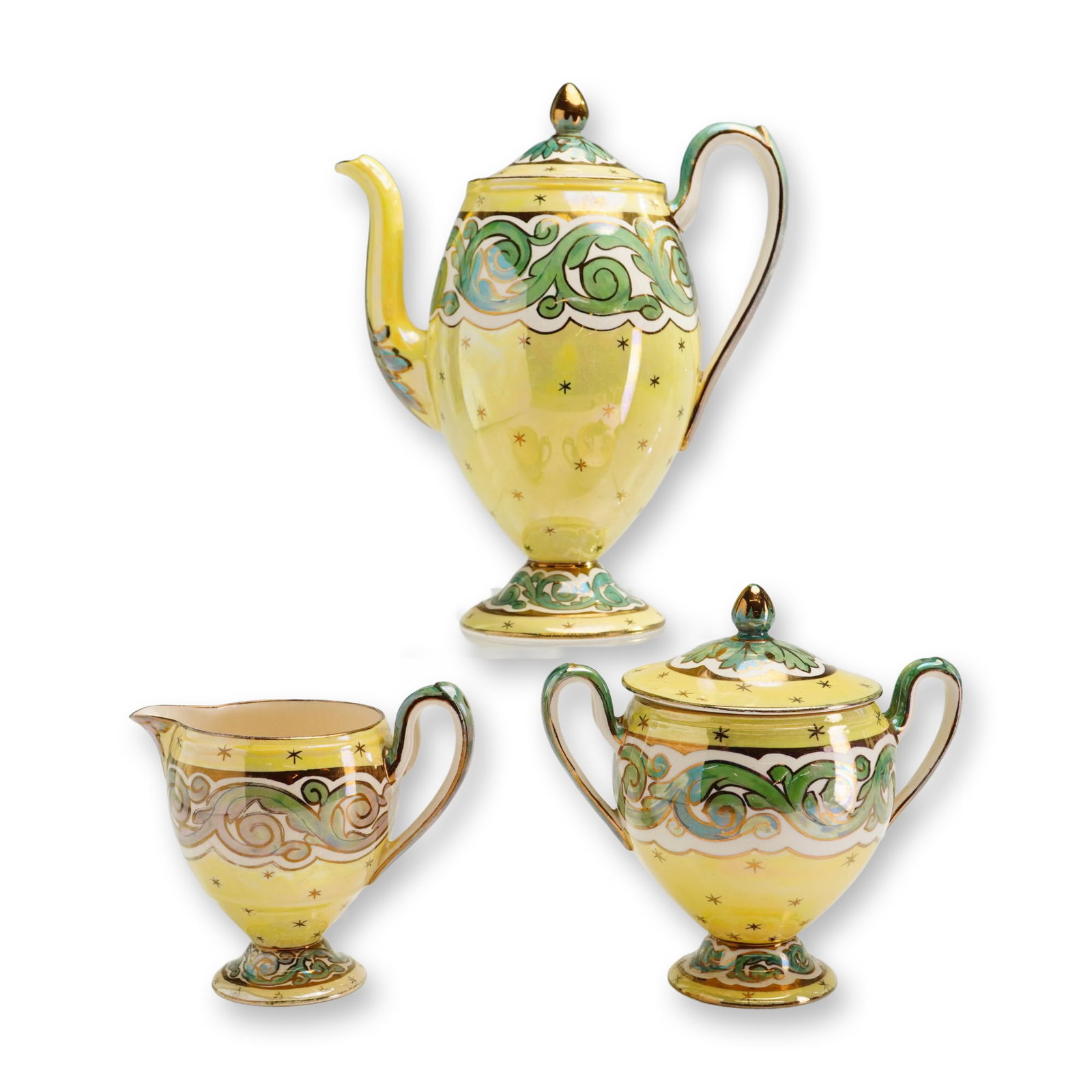 Three-Piece Wedgwood Luster Glazed Coffee Service: Early 20th century Wedgwood fine earthenware service in pattern C5263, comprising a tall lidded coffee or hot water pot, a double-handled lidded sugar bowl, and a cream jug. The set features a pale ye