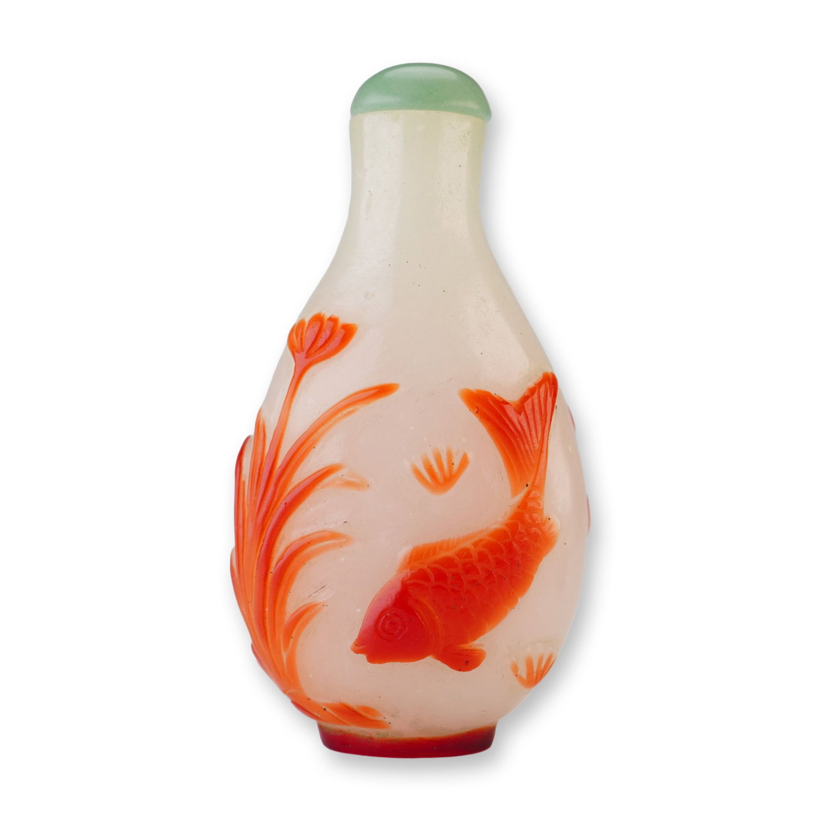 Peking Glass Snuff Bottle, Red Overlay Crab, Grasshopper, and Fish: Decorated with a red overlay, this Chinese white Peking glass snuff bottle features a fish, a grasshopper, and a crab near botanical elements. It is topped with a light green stopper. Dimensions: "L x