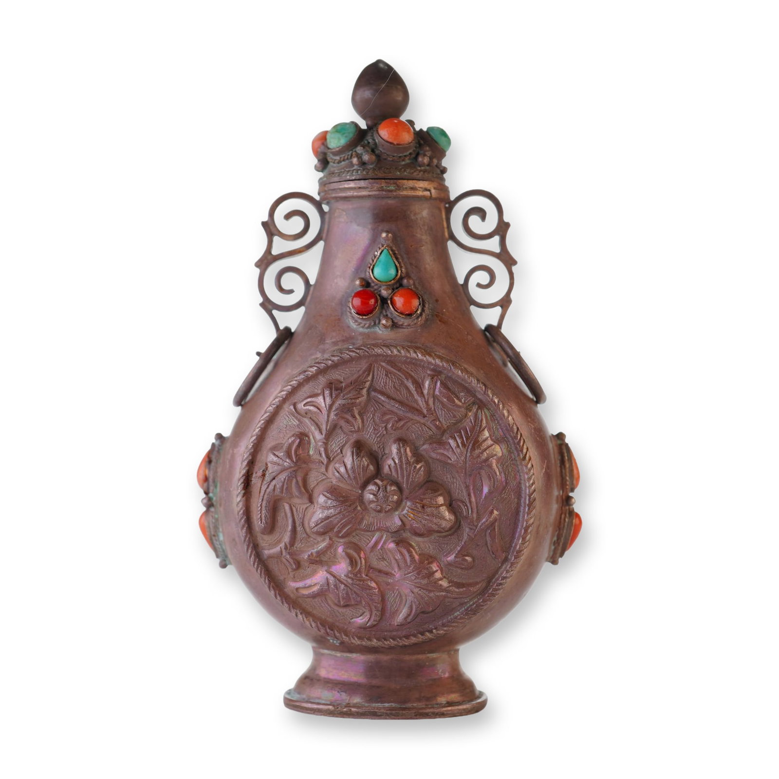 Mongolian Silver Repousse Snuff Bottle, Flowers and Leaves, Scrolling Handles: Embellished with coral and turquoise stones, this Mongolian silver repousse snuff bottle with stopper features round panels showcasing high-relief flowers surrounded by leaves, and is accented by scro