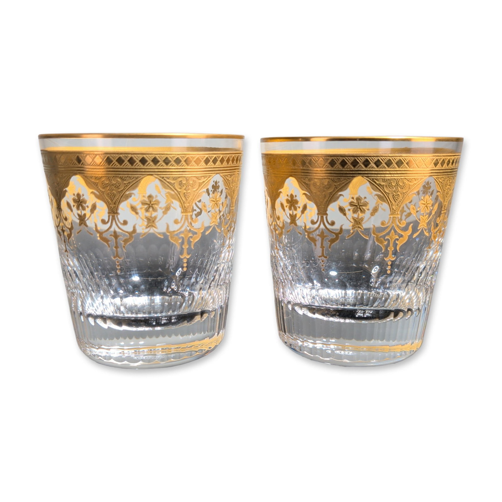 2pc Baccarat France Prestige Gold Encrusted Crystal Tumblers: Baccarat, France, pair of rocks glasses in lead crystal from the Prestige pattern, featuring acid-etched and gold-encrusted decorative borders. Each vessel is decorated with a gilt rim of diamond latt
