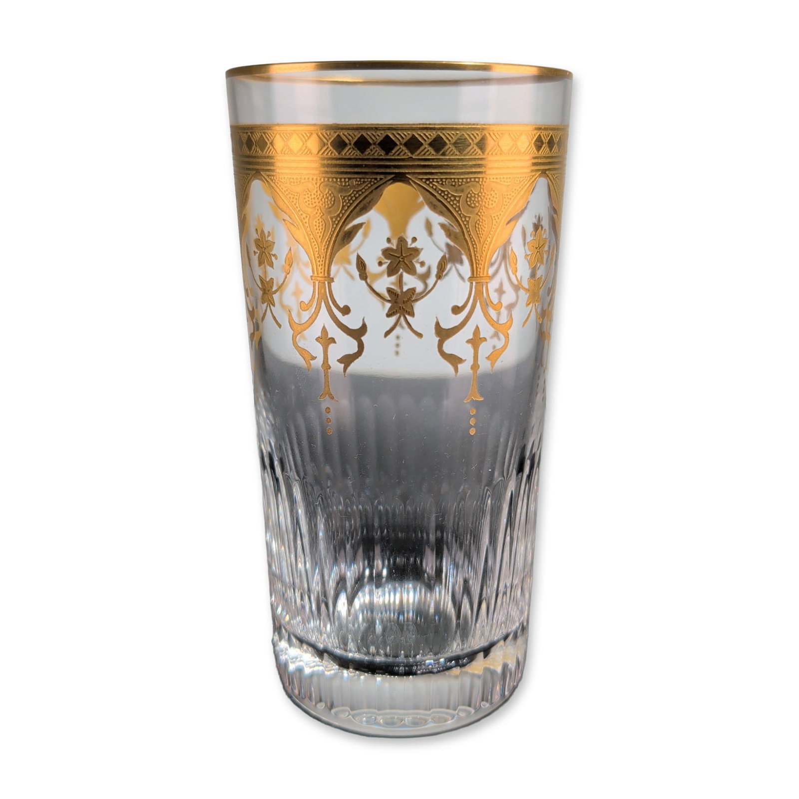 Baccarat France Prestige Gold Encrusted Highball Glass: Baccarat, France, crystal highball glass in the Prestige pattern. The tall cylindrical lead crystal vessel features a wide acid-etched and gilded band at the rim decorated with Neoclassical motifs inc