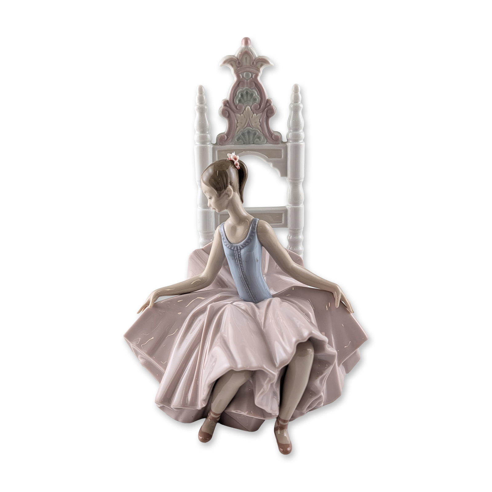 Lladro Spanish Porcelain After the Show Figurine: Lladro Spanish glazed porcelain figurine titled After the Show, model number 6484, designed by sculptor Salvador Debon. The piece depicts a young ballerina seated on an ornate, high-backed Renaissance