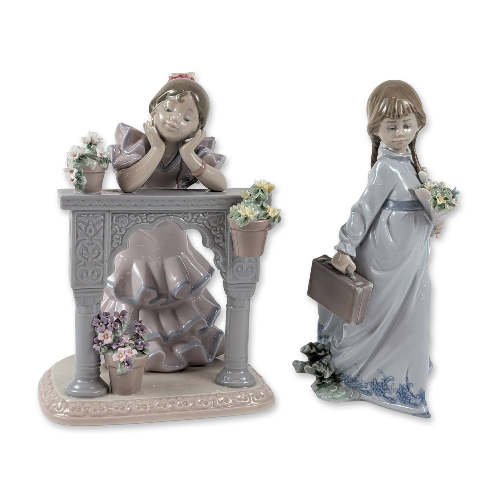 Pair of Lladro Glazed Porcelain Girl Figurines: Lladro, Spain. Two glazed porcelain figurines including A Perfect Day and School Days. A Perfect Day, model number 6480, was sculpted by Jose Malavia and features a young girl in a tiered lavender-gra