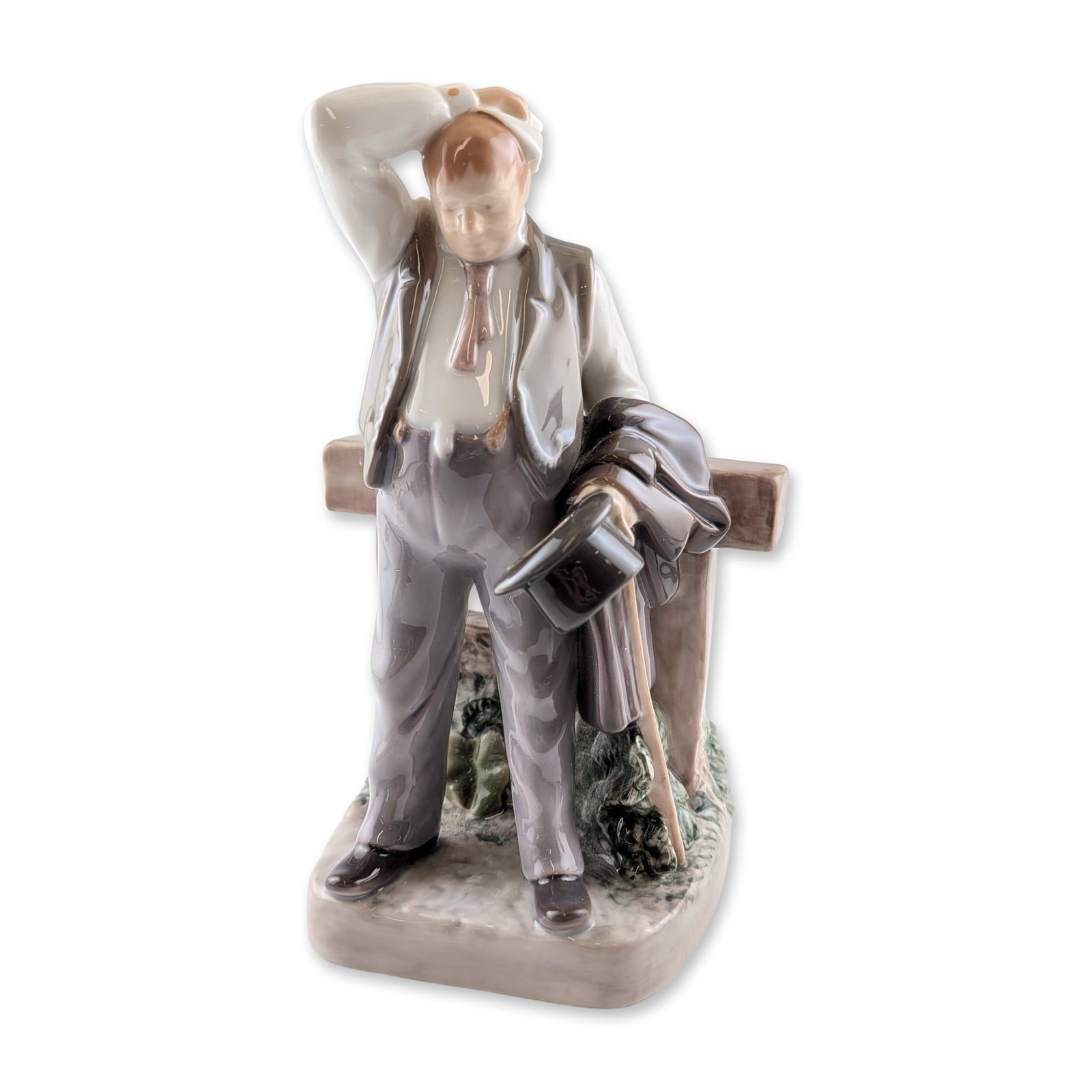 Bing and Grondahl Porcelain The Thirsty Man Figurine: Danish porcelain figurine produced by Bing and Grondahl, titled Den Torstige Mand (The Thirsty Man). The polychrome glazed figure depicts a man in early 20th-century attire mopping his brow while lean