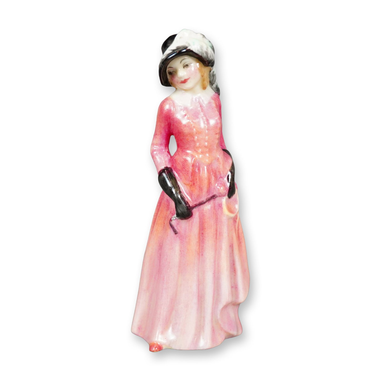 Royal Doulton Bone China Figurine, Maureen M84: Hand painted figure of a woman in a long pink riding gown, and black gloves and hat. Royal Doulton backstamp. Dimensions: 1.75"L x 1.5"W x 4"H Manufacturer or Brand: Royal Doulton Country of Origin: E