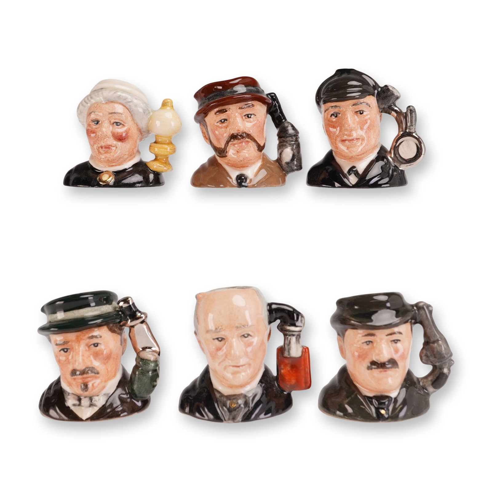 6pc Royal Doulton Sherlock Holmes Tiny Character Jug Set: Collection includes Sherlock Holmes (D7011), Doctor Watson (D7012), Inspector Lestrade (D7015), Professor Moriarty (D7014), Mrs. Hudson (D7013), and Jefferson Hope (D7016). Each marked with the Royal 