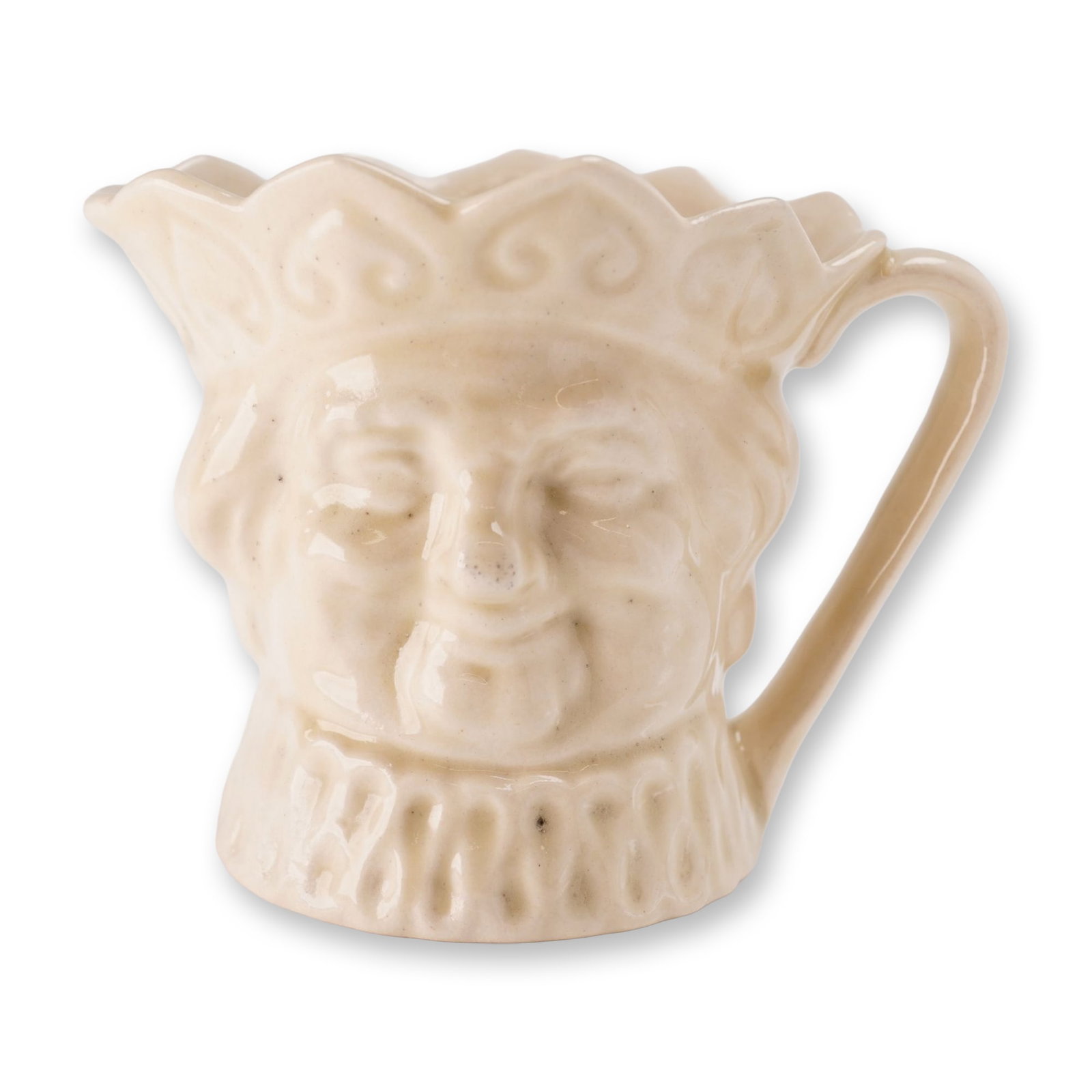 Royal Doulton Creamware Small Character Jug, Old King Cole: Small character jug in monochrome cream-glazed earthenware, depicting the nursery rhyme figure Old King Cole. The relief-molded form features the character's face with a crown-shaped rim and a ruff co