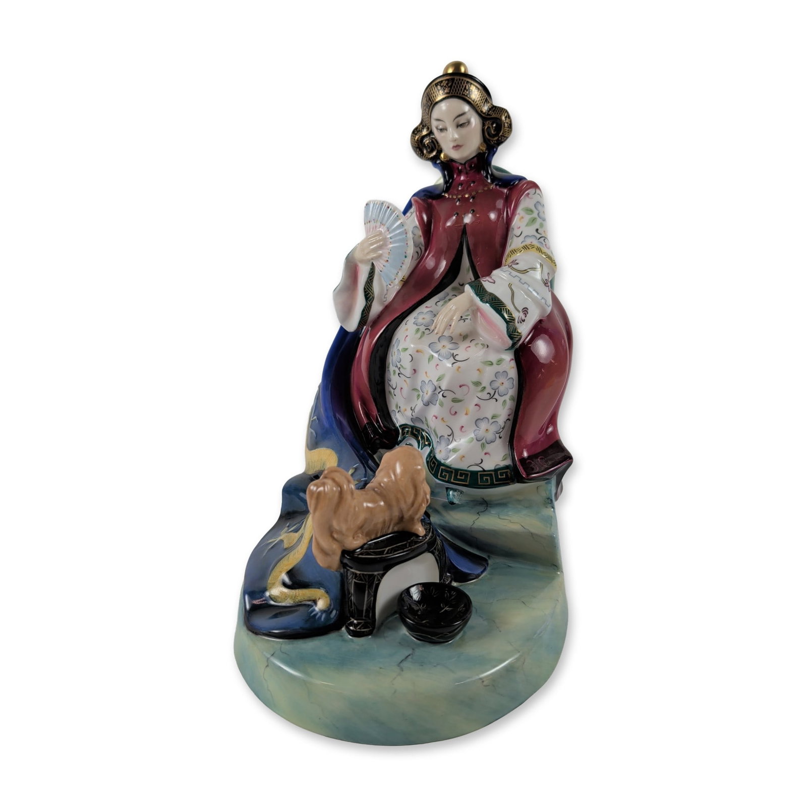 Royal Doulton Tzu-hsi Empress Dowager Porcelain Figurine: Royal Doulton (English) bone china figurine titled Tzu-hsi, Empress Dowager, from the Les Femmes Fatales series. Modelled by Peggy Davies, the seated figure is decorated in polychrome glazes depicting