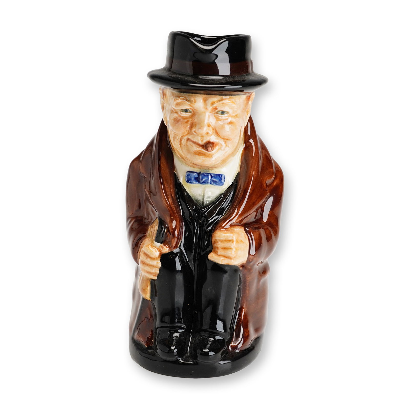 Royal Doulton Colorway Medium Toby Jug, Winston Churchill: Hand-painted figural jug depicting Winston Churchill . The renowned British statesman, military officer, author, and two-time Prime Minister of the United Kingdom is portrayed seated and dressed in a 