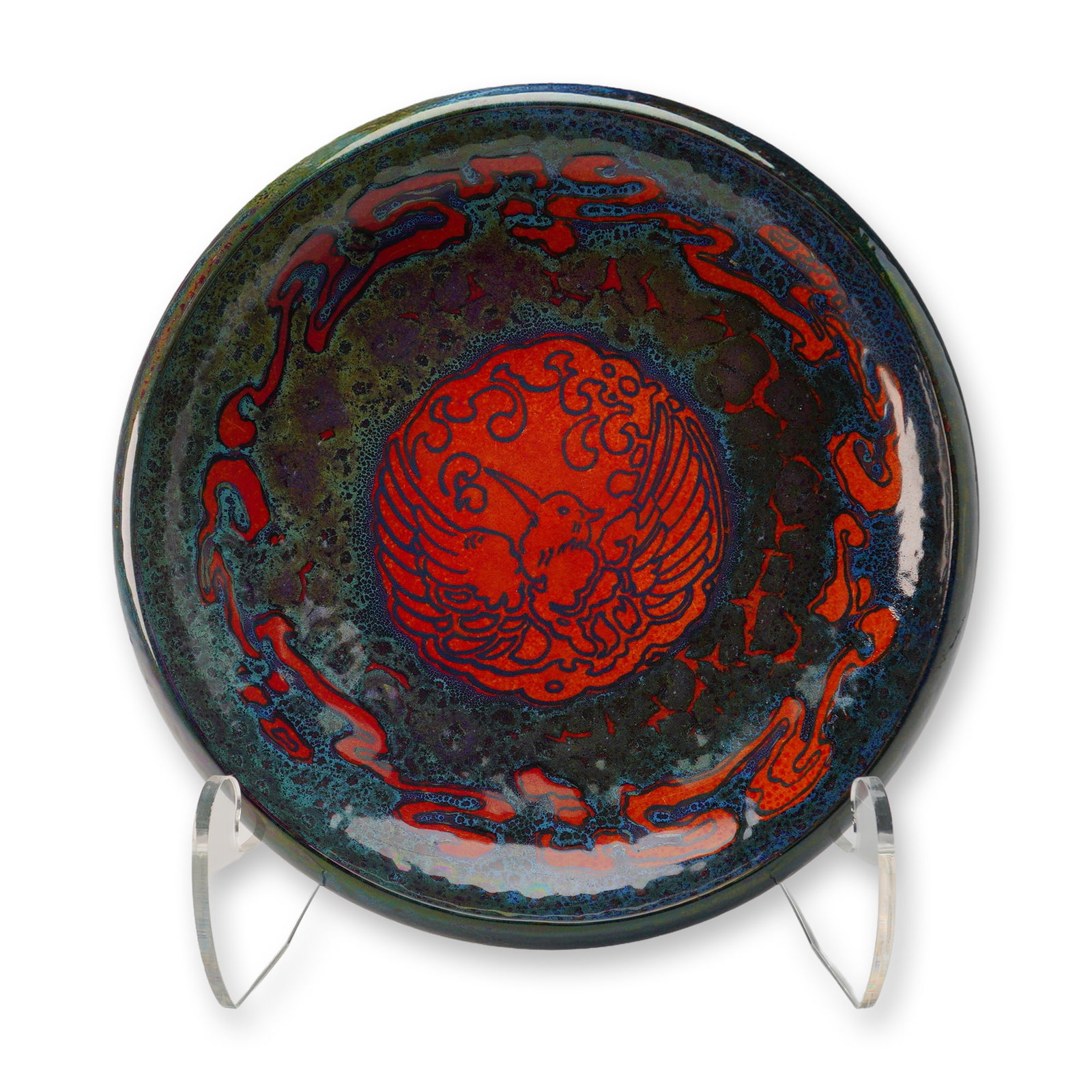 Royal Doulton Bird Motif Flambe Sung Dish: A shallow flambe-glazed dish by Royal Doulton, England, showcasing the distinct Sung glaze technique characterized by its iridescent mottled ground and striking coloration. The interior features a vib