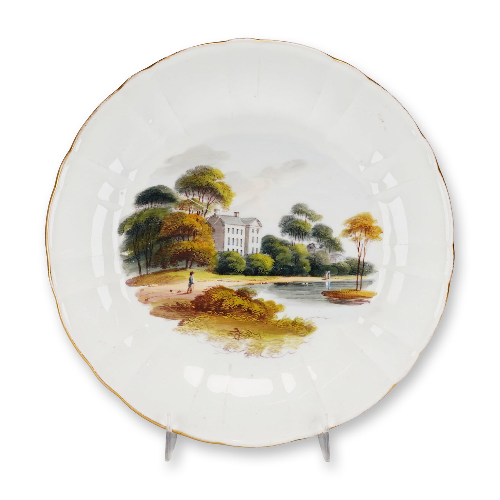 Wedgwood Porcelain Topographical Dessert Plate Near Richmond Surry: This circular porcelain dessert plate was manufactured by Wedgwood in Staffordshire, England. The plate features a fluted, scalloped rim accented with a thin gilded edge. The center is decorated with 