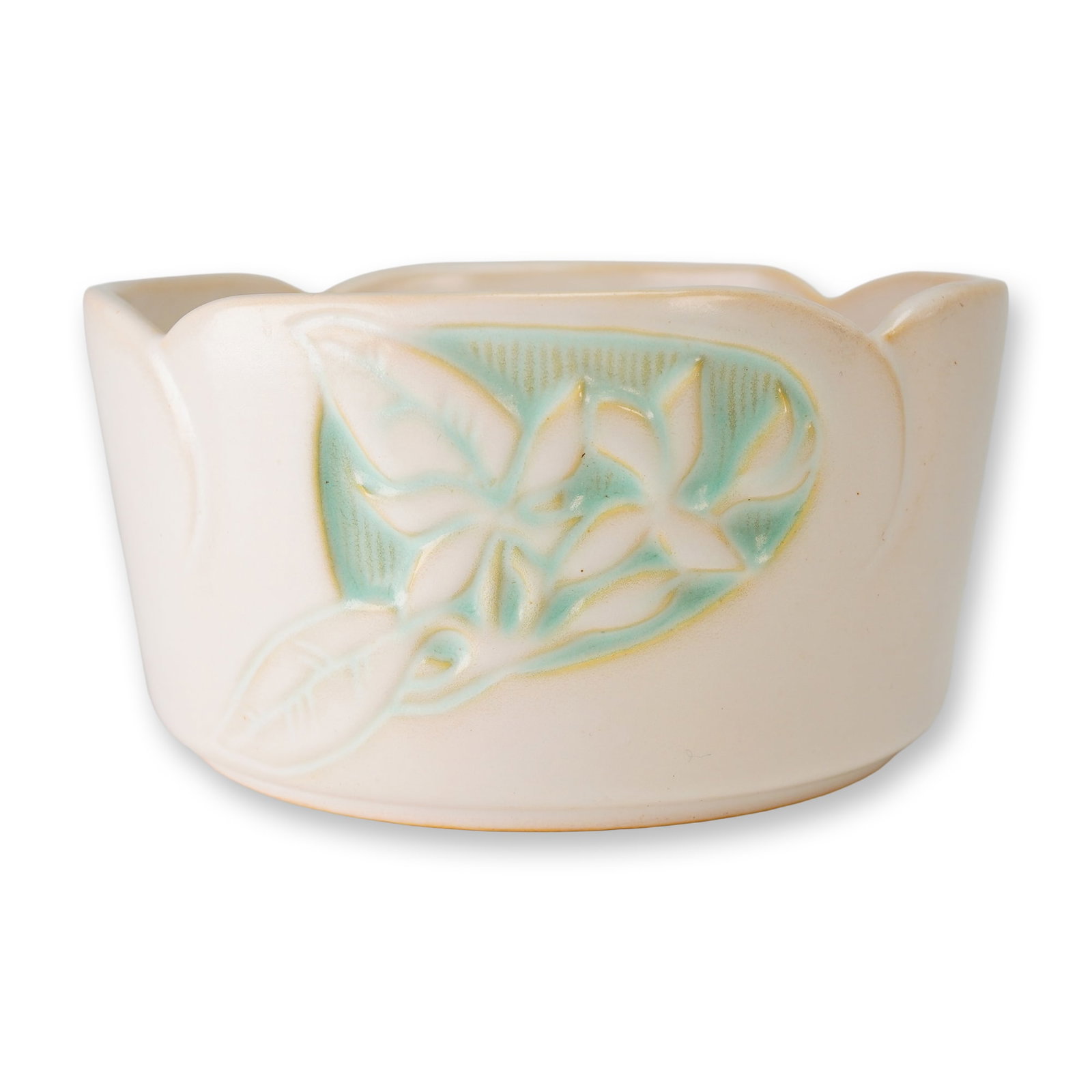 Roseville Pottery Art Bowl, Silhouette: Roseville art pottery bowl in the Silhouette pattern, featuring a mid century modern aesthetic. The ceramic vessel is finished in a matte off-white glaze and is characterized by a scalloped rim. The e