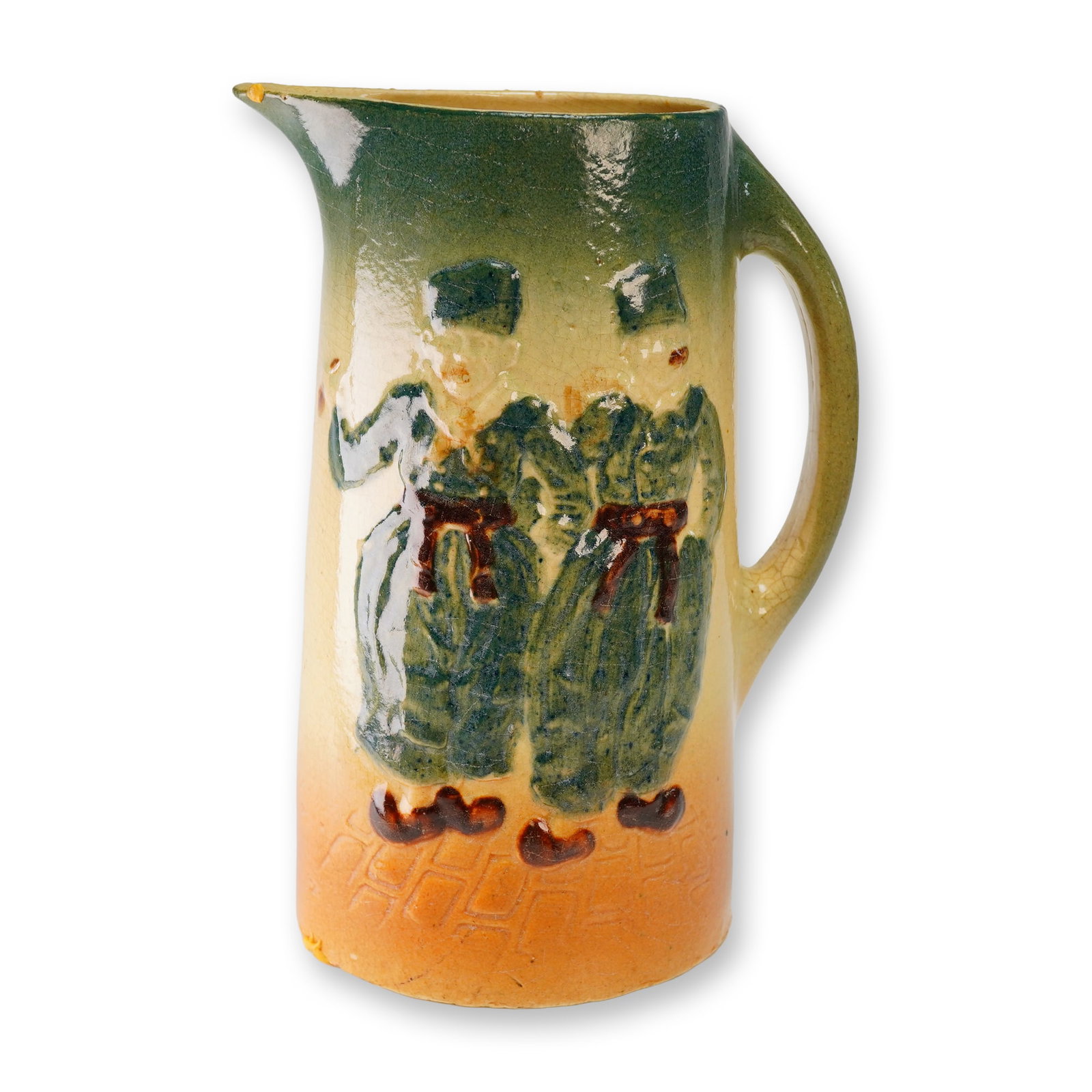 Roseville Pottery Earthenware Holland Tankard: This Roseville Holland pottery pitcher is an earthenware vessel featuring embossed relief figures in traditional Dutch attire, including wooden shoes and hats. The decoration includes two Dutch figure