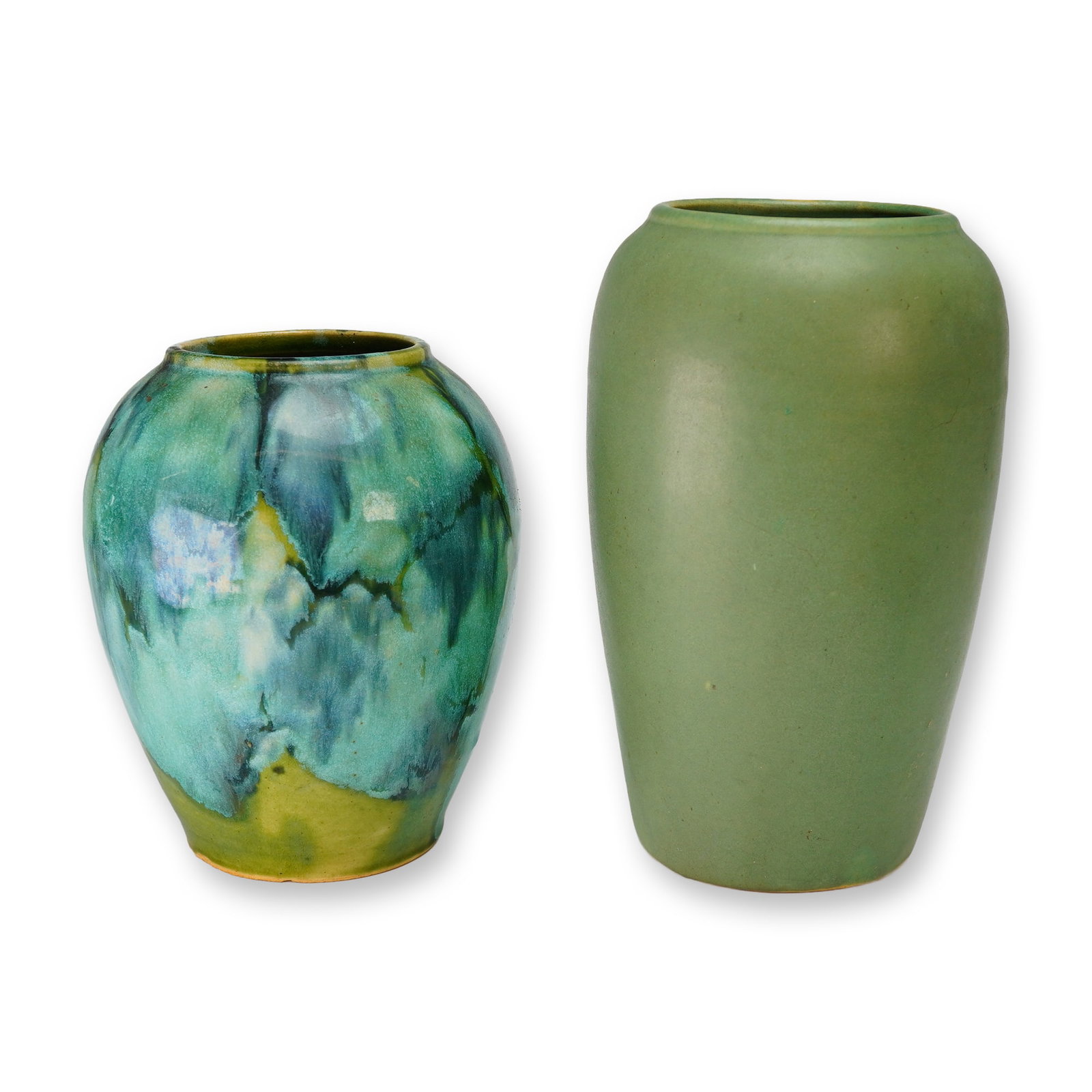 McCoy and Zainesville Matte Green and Drip Glaze Vases: This lot features two pieces of American art pottery from the early to mid-20th century. The first is a tall, tapered ovoid earthenware vase attributed to Zanesville Stoneware, finished in a uniform m