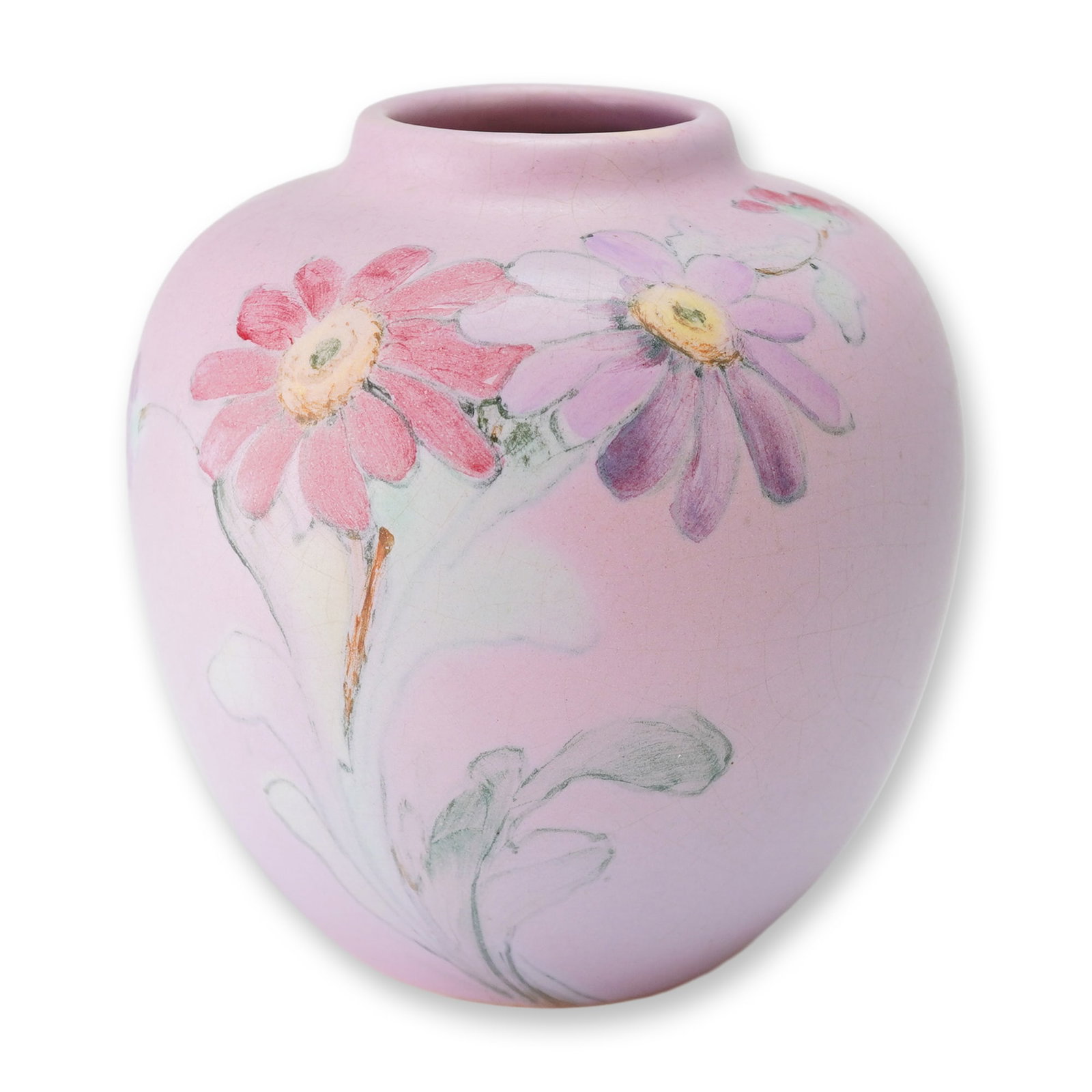 Weller Pottery Floral Vase, Hudson: This Weller Hudson pottery vase features a bulbous ovoid form with a short constricted neck. The ceramic vessel is finished in a matte pale pink glaze and decorated with hand painted floral motifs dep