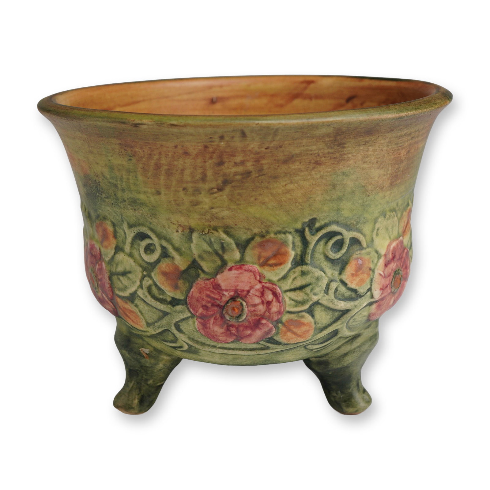 Weller Pottery Footed Jardiniere, Flemish: Weller Pottery Flemish pattern was produced circa 1905-1928. The vessel features a relief-molded floral design of wild roses in pink and orange-toned foliage encircling the lower body. The exterior is