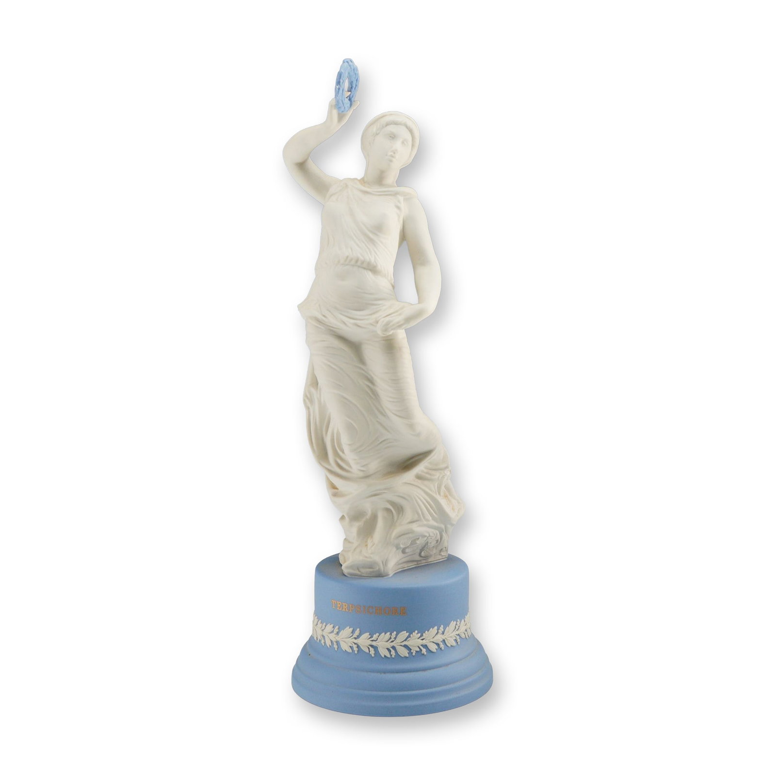 Wedgwood Jasperware and Parian Porcelain Figurine of Terpsichore: This neoclassical figurine depicts Terpsichore, the Muse of dance and choral song, produced by the English pottery firm Wedgwood. The figure is crafted in matte white parian porcelain, modeled in a gr