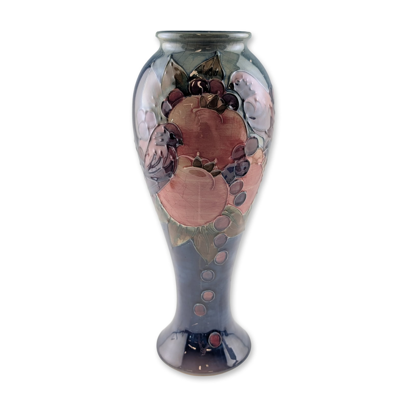 Moorcroft Finches and Fruit Pattern Glazed Pottery Vase: Moorcroft pottery vase in the Finches and Fruit pattern, designed by Sally Tuffin. Tall baluster-form glazed earthenware vessel with a flared neck and broad, spreading foot. The exterior features tube