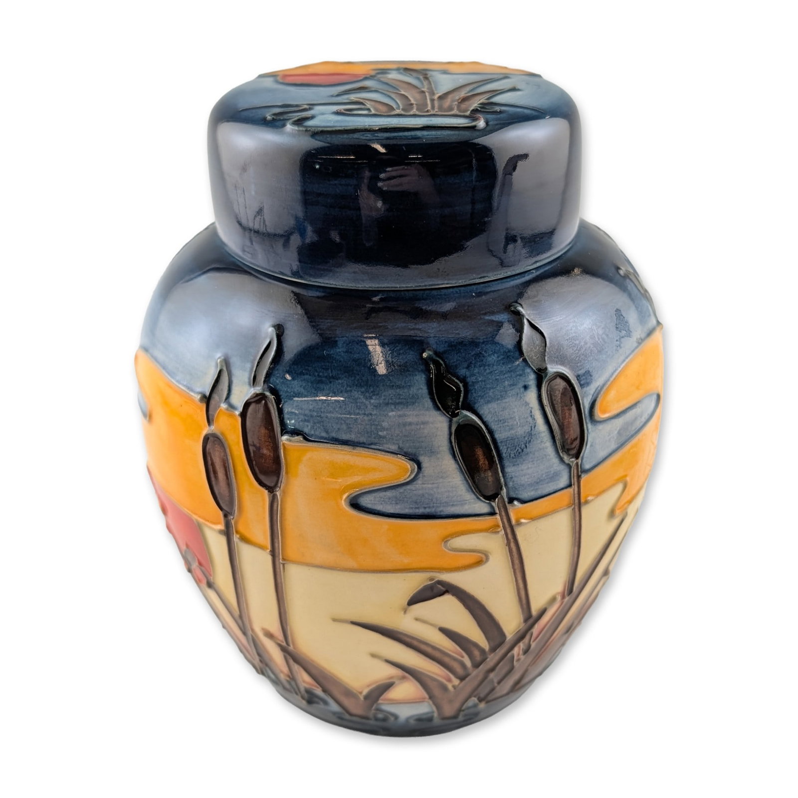 Moorcroft Philip Richardson Reeds at Sunset Ginger Jar: Moorcroft earthenware lidded ginger jar in the Reeds at Sunset pattern, designed by Philip Richardson, circa 1987. The vessel features an ovoid form with a fitted domed lid, decorated in the tradition