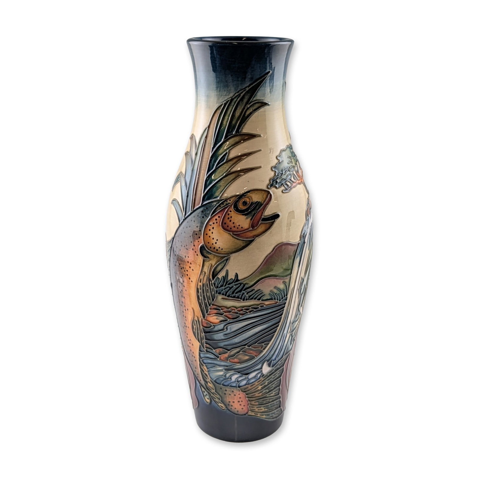 Moorcroft Philip Gibson Flying Trout Pottery Vase: Moorcroft Pottery, England. Slender ovoid earthenware vase in the Flying Trout pattern designed by Philip Gibson, featuring tube-lined decoration of a trout leaping from a river scene with rocks and f