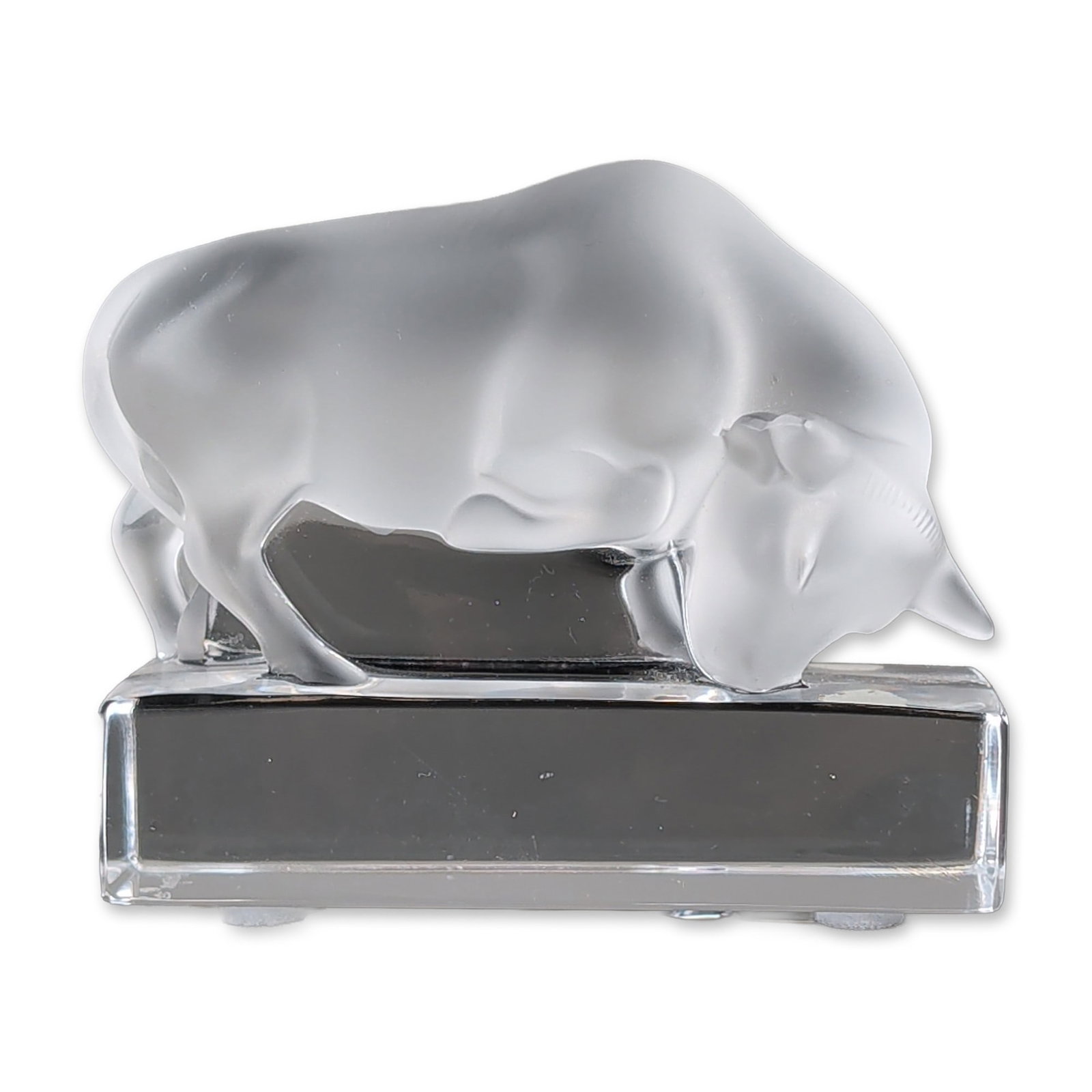 Lalique French Frosted Crystal Bull Figurine: Taureau bull figurine in frosted and polished clear crystal, featuring a satin-finished charging bull figure integrated into a rectangular polished base. Acid-etched signature Lalique France with regi