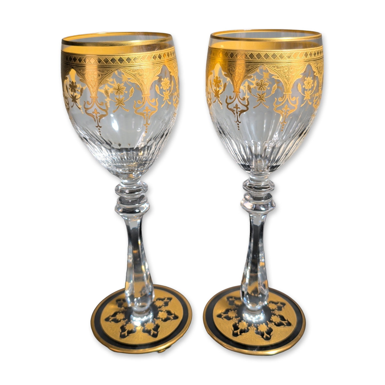 2pc Baccarat France Prestige Gold Encrusted Crystal Wine Glasses: Baccarat, France, pair of Prestige pattern crystal wine goblets featuring gold-encrusted etched decoration with floral sprays, scrolling acanthus leaves, and diaper patterns. Each goblet features a ta