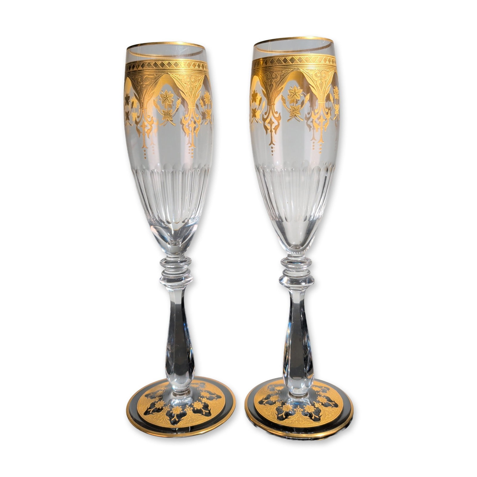 2pc Baccarat France Prestige Gold Encrusted Crystal Champagne Flutes: Baccarat, France, pair of champagne flutes in lead crystal, featuring the Prestige pattern with a wide band of acid-etched and gilded neo-classical floral and foliate motifs. Bowls are designed with v
