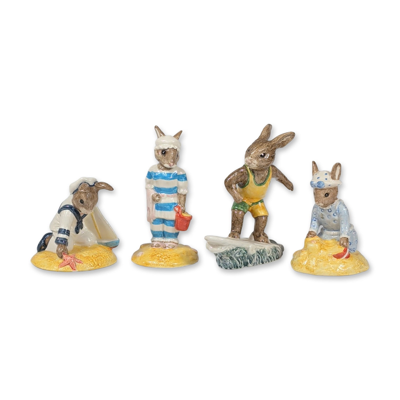 4pc Royal Doulton Bunnykins Figurines: Royal Doulton. Group of four glazed fine bone china figurines from the Bunnykins series. Bases are marked with Royal Doulton backstamps, copyright dates ranging from 1993 to 1996, and respective model