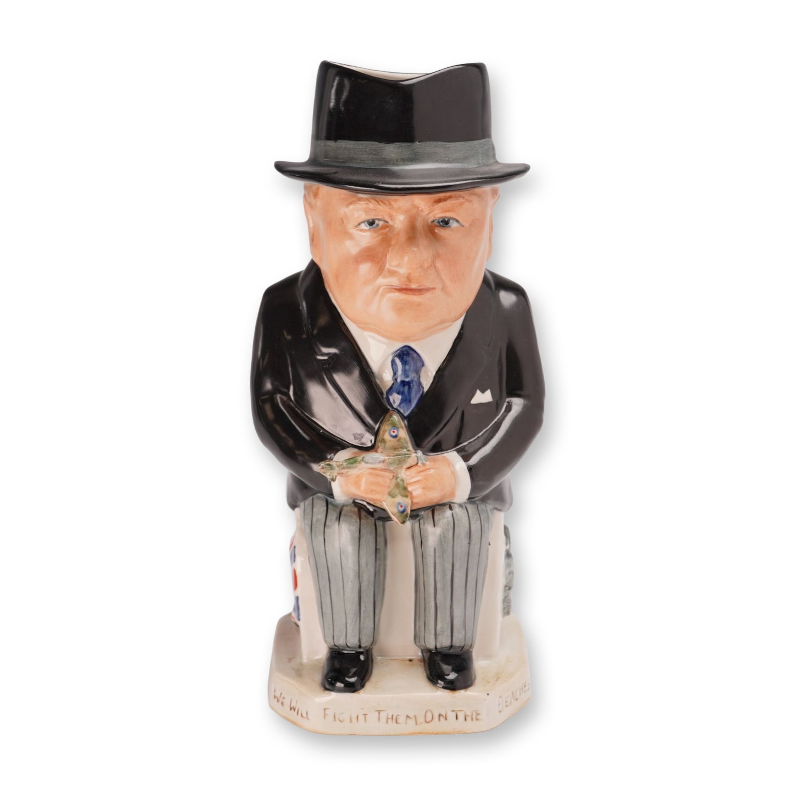 Wilkinson World War II Allied Leaders Collectin Toby Jug, Prime Minister Winston Churchill: Designed by Ray Noble. Limited edition 112 of 150. Winston Churchill figural jug in glazed earthenware. This full-figure jug depicts the British Prime Minister seated in a black suit, top hat, and pin