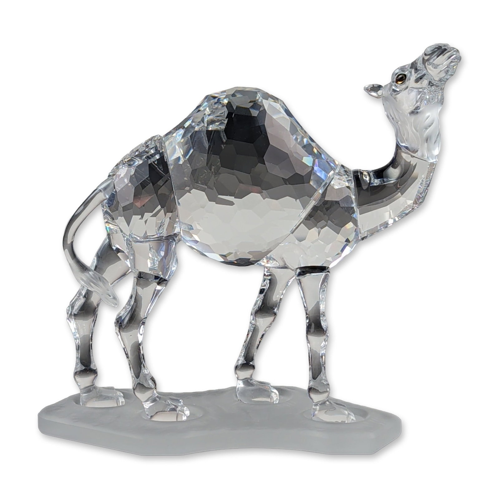 Swarovski Crystal Large Camel Figurine: Swarovski crystal dromedary camel figurine, model number 247683, from the African Wildlife collection. The piece features a multi-faceted central body with smooth clear crystal neck, head, legs, and t