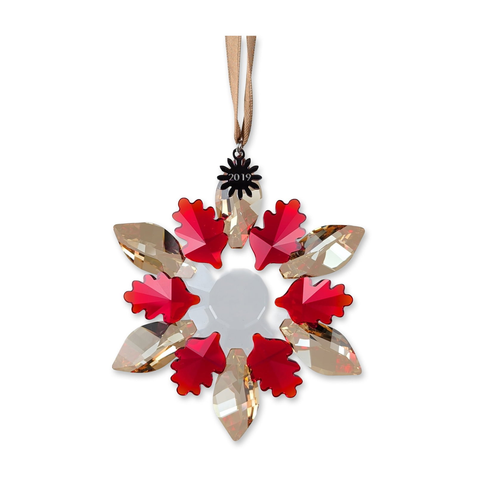 Swarovski SCS 2019 Winter Sparkle Crystal Ornament: Swarovski SCS 2019 Winter Sparkle ornament in faceted crystal. The festive star-form design features six vibrant red oak-leaf-shaped elements alternating with six elongated champagne-toned crystals, a
