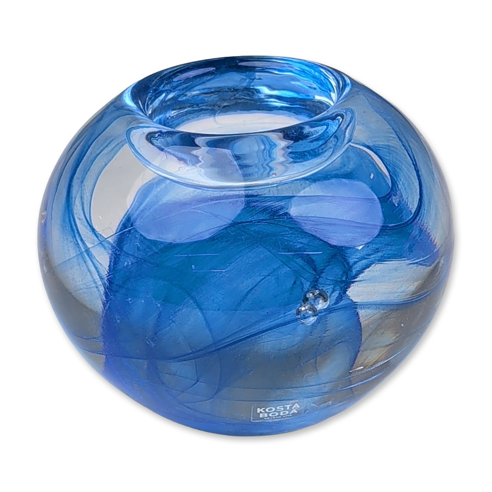 Kosta Boda Art Glass Votive Holder, Blue Moon: Swedish Kosta Boda art glass votive candle holder in the Blue Moon pattern. The spherical clear glass form contains internal translucent cobalt blue ribbons and veil-like decoration. The object featur