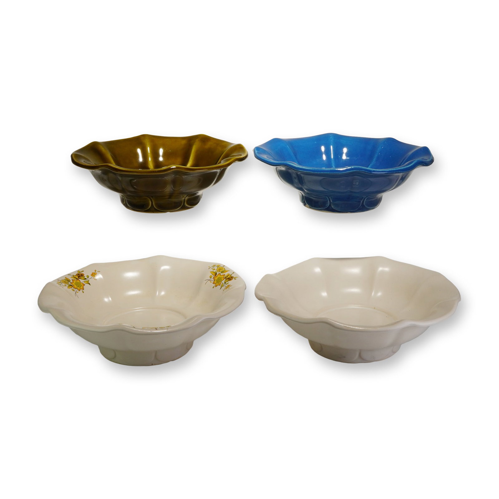 4pc McCoy Pottery Flower Shaped Bowls in Various Colors and Decorations: A collection of 4pc McCoy Pottery flower shaped bowls featuring a scalloped rim and fluted body design. This group includes ceramic pieces finished in various glazes, including olive green, bright blu