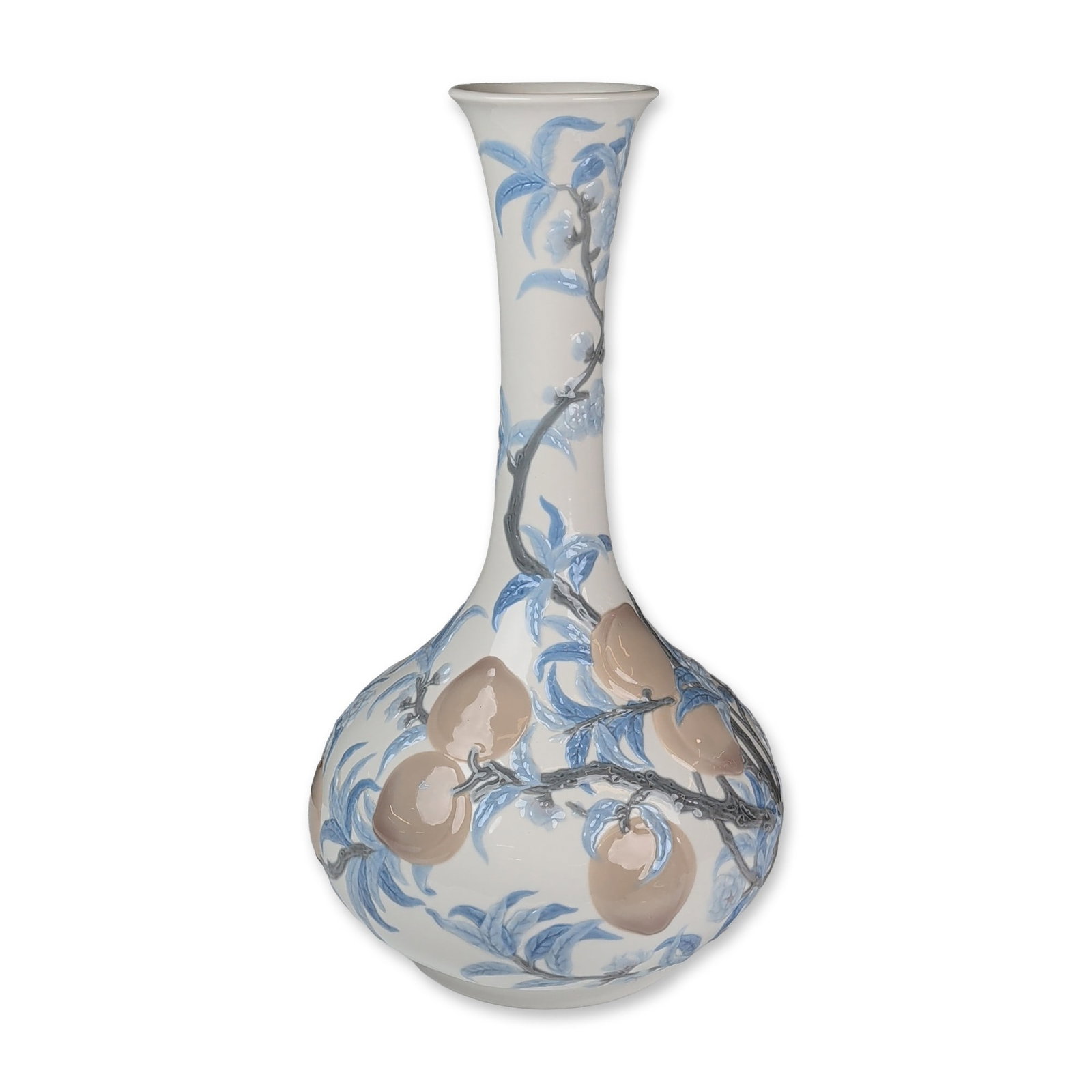 Rare Lladro Large Porcelain Vase, White with Peaches: Large porcelain vase of tall-necked ovoid form, featuring a high-relief molded design of a peach tree branch wrapping around the bulbous body and neck. The hand-painted underglaze decoration depicts p