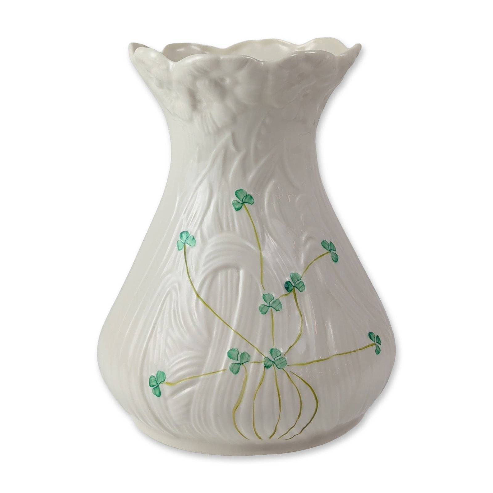 Belleek Shamrock Daisy Parian Porcelain Vase: Belleek (Ireland) Parian porcelain vase in the Daisy pattern. Featuring relief-molded stylized foliate ribbing and hand-painted green shamrocks on trailing stems. Creamy-colored glaze finish with a fl