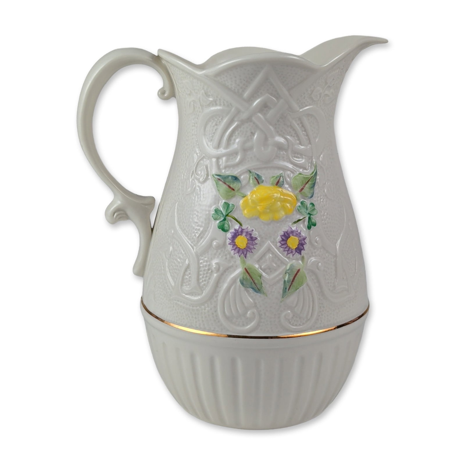 Belleek Irish Heritage Collection Celtic Vision Pitcher: Belleek Pottery, Ireland. Celtic Vision pitcher in Parian porcelain, produced for the Irish Heritage Collection to commemorate the factory 150th anniversary (1857-2007). The vessel features a fluted l