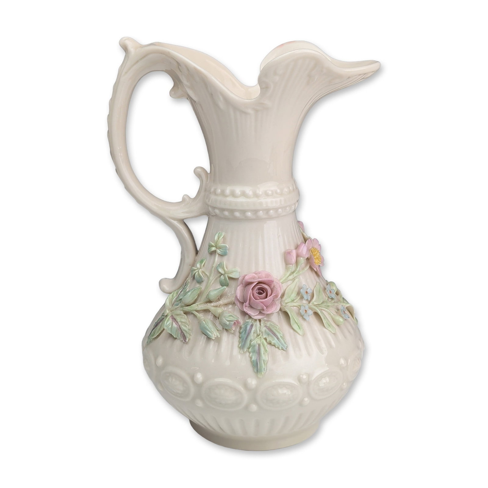 Belleek Ireland Aberdeen Floral Porcelain Pitcher: Belleek Ireland Aberdeen pattern decorative ewer in iridescent Parian porcelain, featuring a fluted body, beaded neck, and ruffled rim with an ornate scrolled handle. The surface is decorated with han