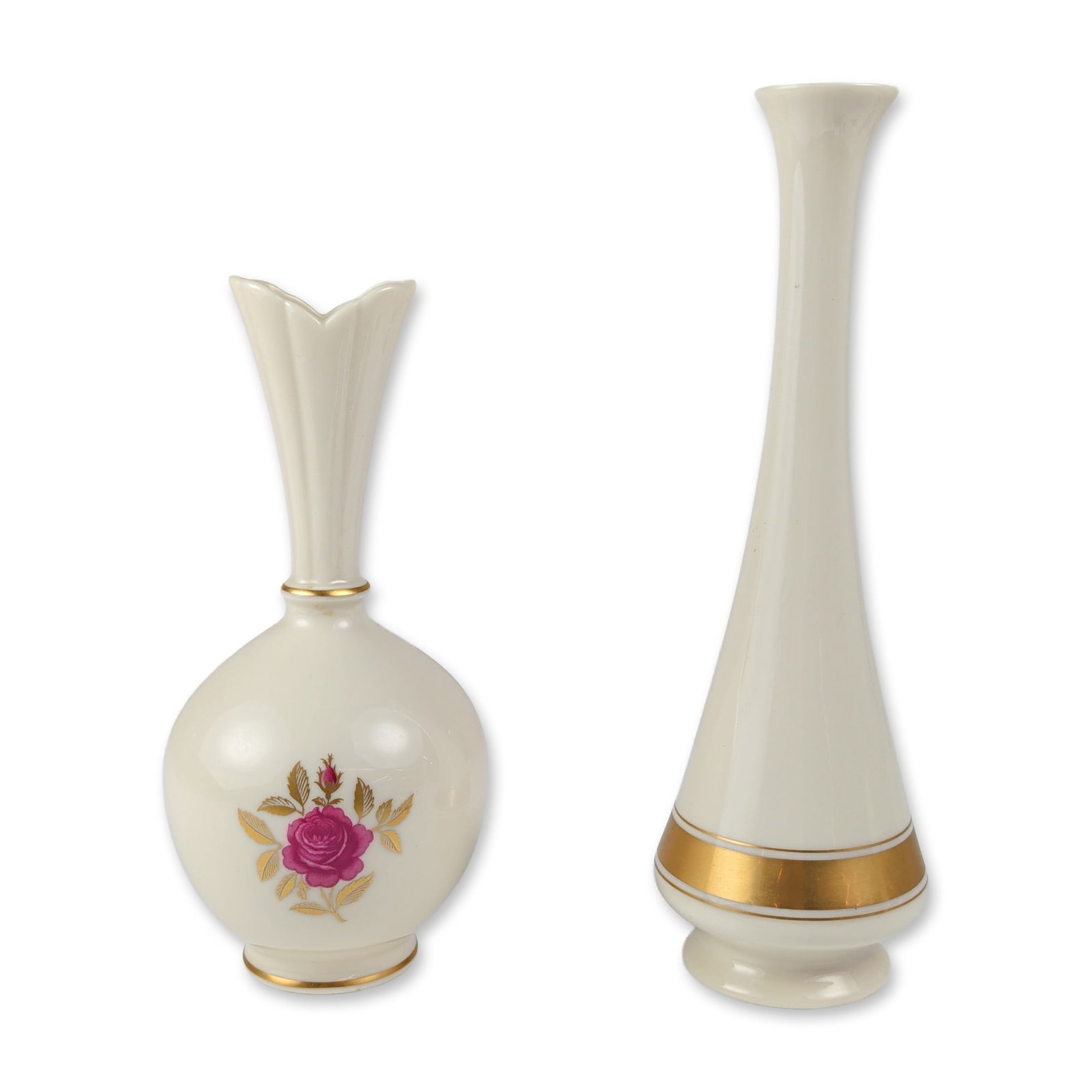 2pc Lenox American Porcelain Gold Trimmed Bud Vases: Lenox, United States. Two bud vases in signature cream-colored porcelain with 24 karat gold accents. One vase features a tall, tapered silhouette with a flared rim and a wide polished gold band encirc