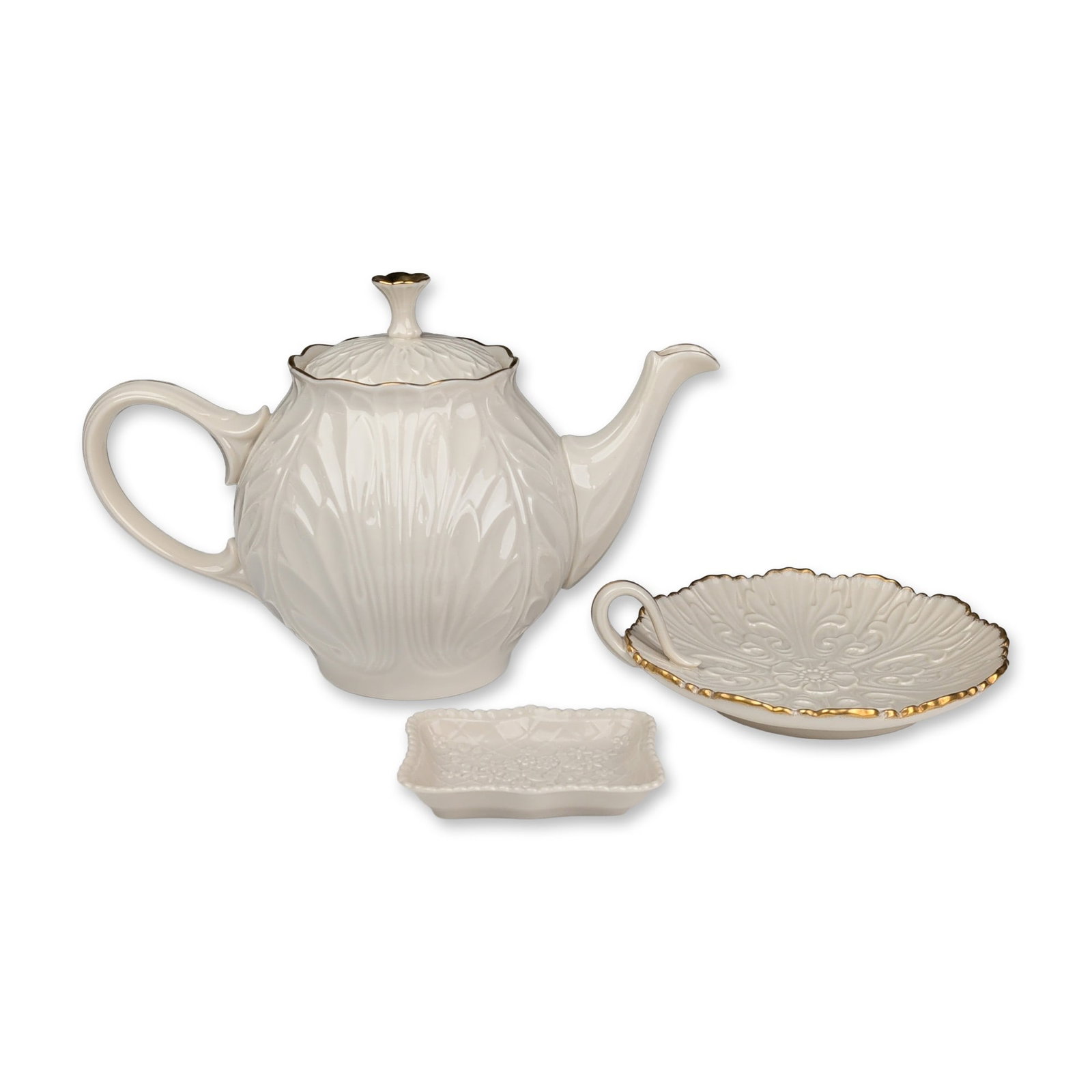 3pc Lenox Porcelain Dishes- Cottage Teapot with Lid, Candy and Trinket Dish: Trio of porcelain items featuring embossed acanthus leaf and botanical motifs with 24-karat gold accents. The lot includes a teapot with a matching domed lid and gold-tipped finial, a scalloped leaf-s