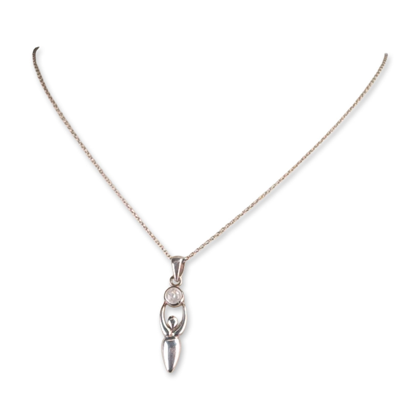 Tiffany & Co by Elsa Peretti Sterling Silver Necklace: A necklace in sterling silver, featuring a stylized goddess form bezel-set with a round cabochon moonstone. The pendant is suspended from a fine cable link chain. The necklace features two hallmark ta