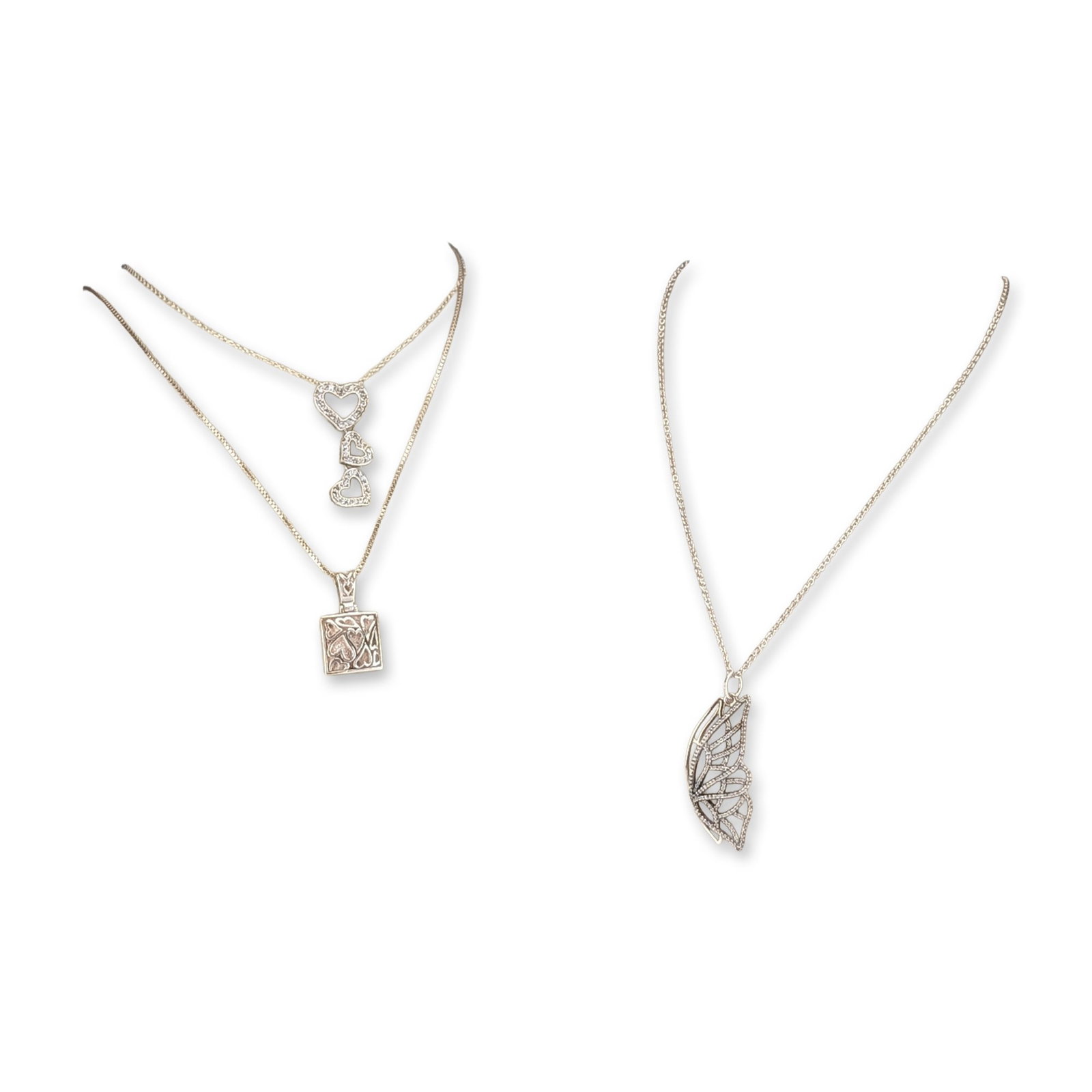 3pc Sterling Silver Heart and Pandora Butterfly Pendant Necklaces: Sterling silver pendant necklaces, featuring a square heart design on a box link chain with lobster claw clasp. Also includes a graduated triple heart pendant with clear accent stones on a cable