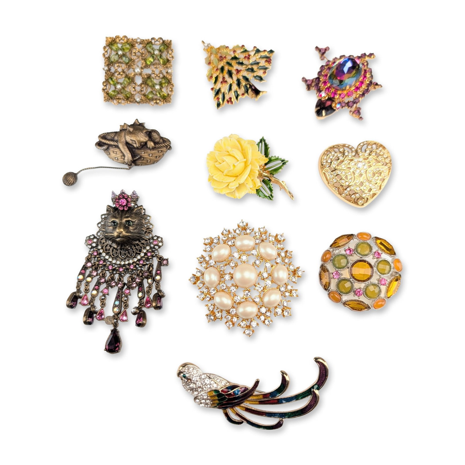 10pc Vintage and Contemporary Costume Brooches: A group of ten costume jewelry brooches in various figural, floral, and geometric designs. The collection includes a Sweet Romance chandelier-style statement brooch featuring a crowned cat head in ant
