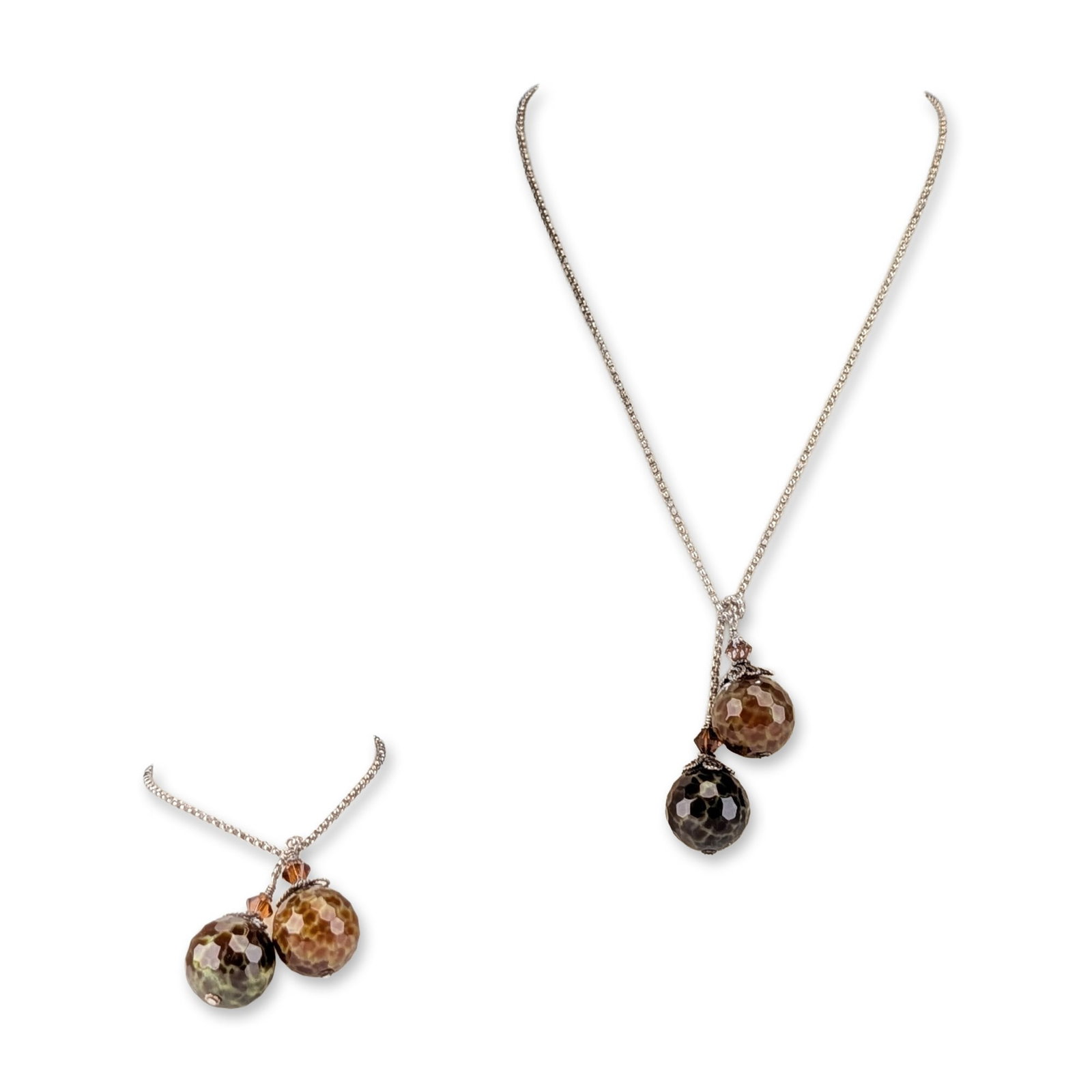 2pc Faceted Stone and Sterling Silver Jewelry Set: Modern necklace and bracelet set in faceted stone and sterling silver, featuring mottled green and brown beads with filigree caps and bicone crystal accents. Wire-wrapped pendant construction on rolo 